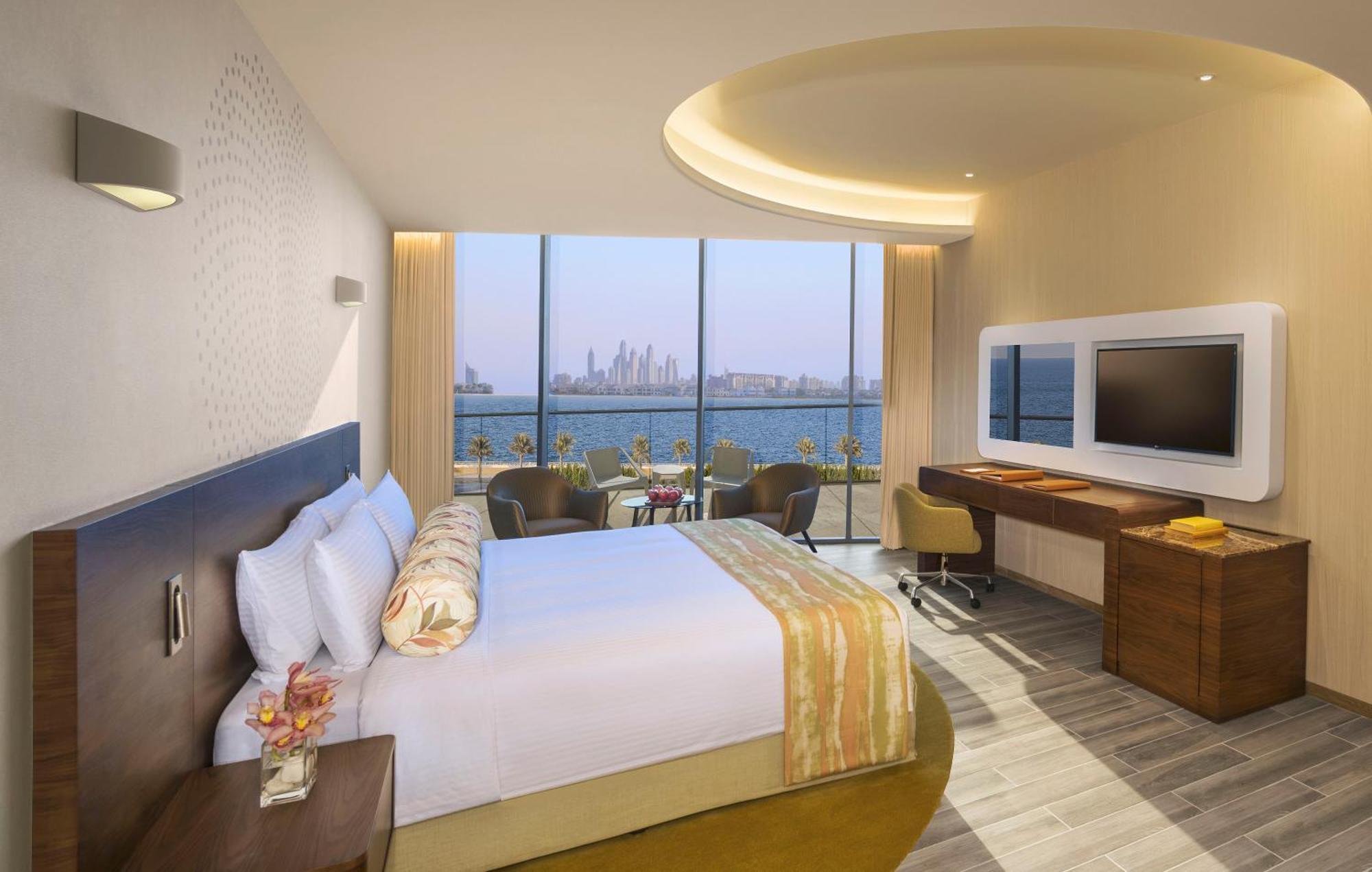 Suite Premium 1 chambre avec Balcon - Vue sur Mer - Accès au Salon Club
