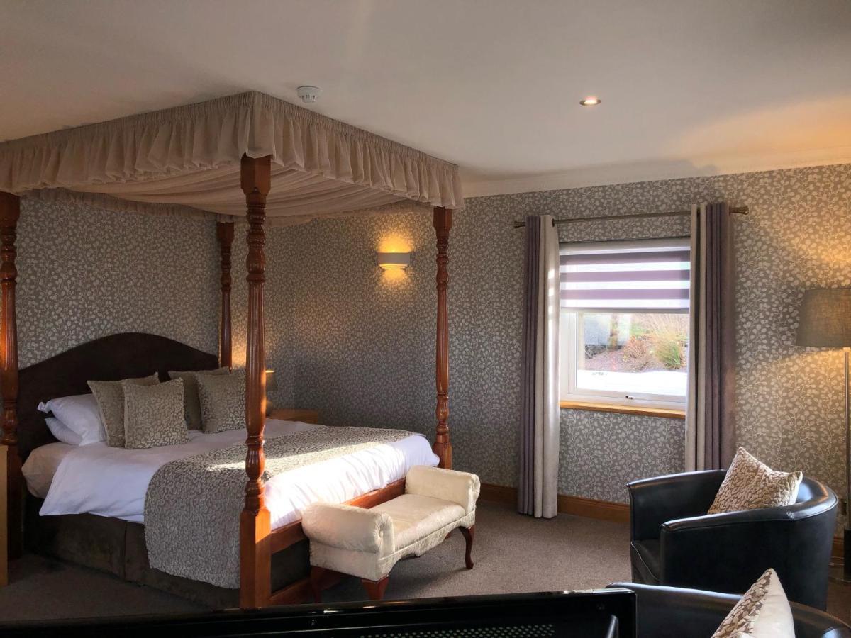 Executive Suite Four Poster Bed