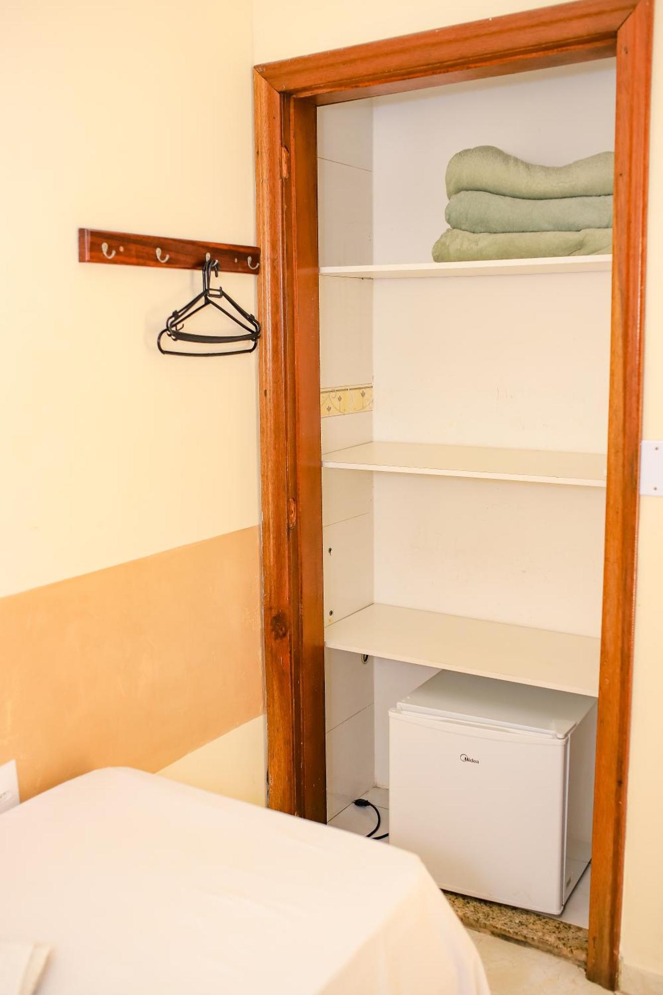 Quarto Quádruplo com Banheiro Privativo
