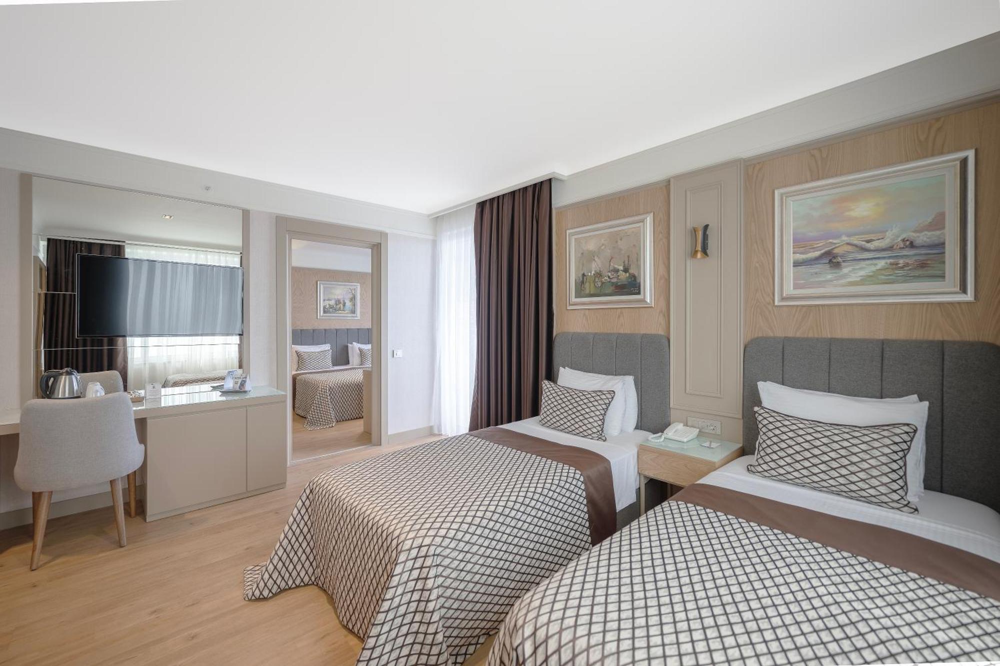 Quarto Família (4 Adultos)