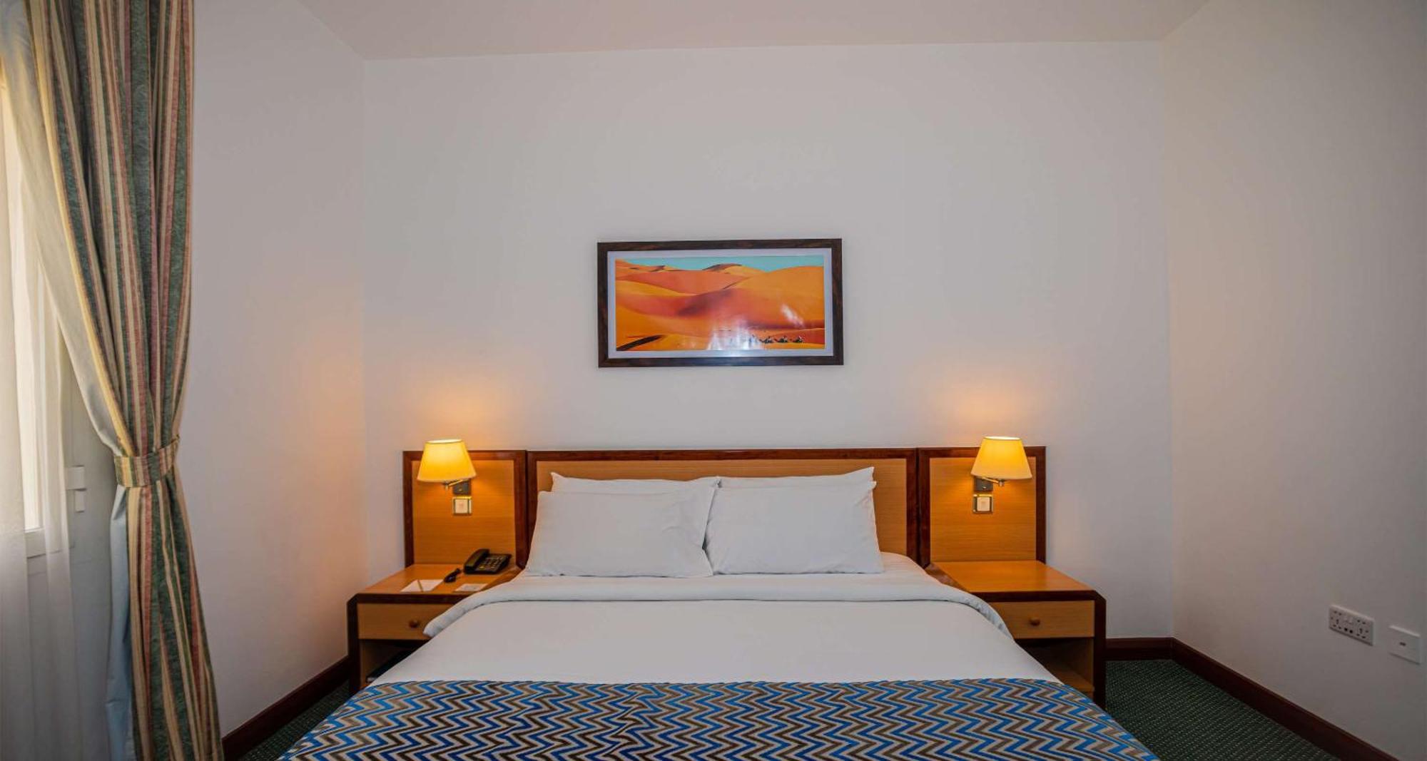 Family Suite One King Bed Two Single Beds Non-Smoking,1618268565:JPEG
