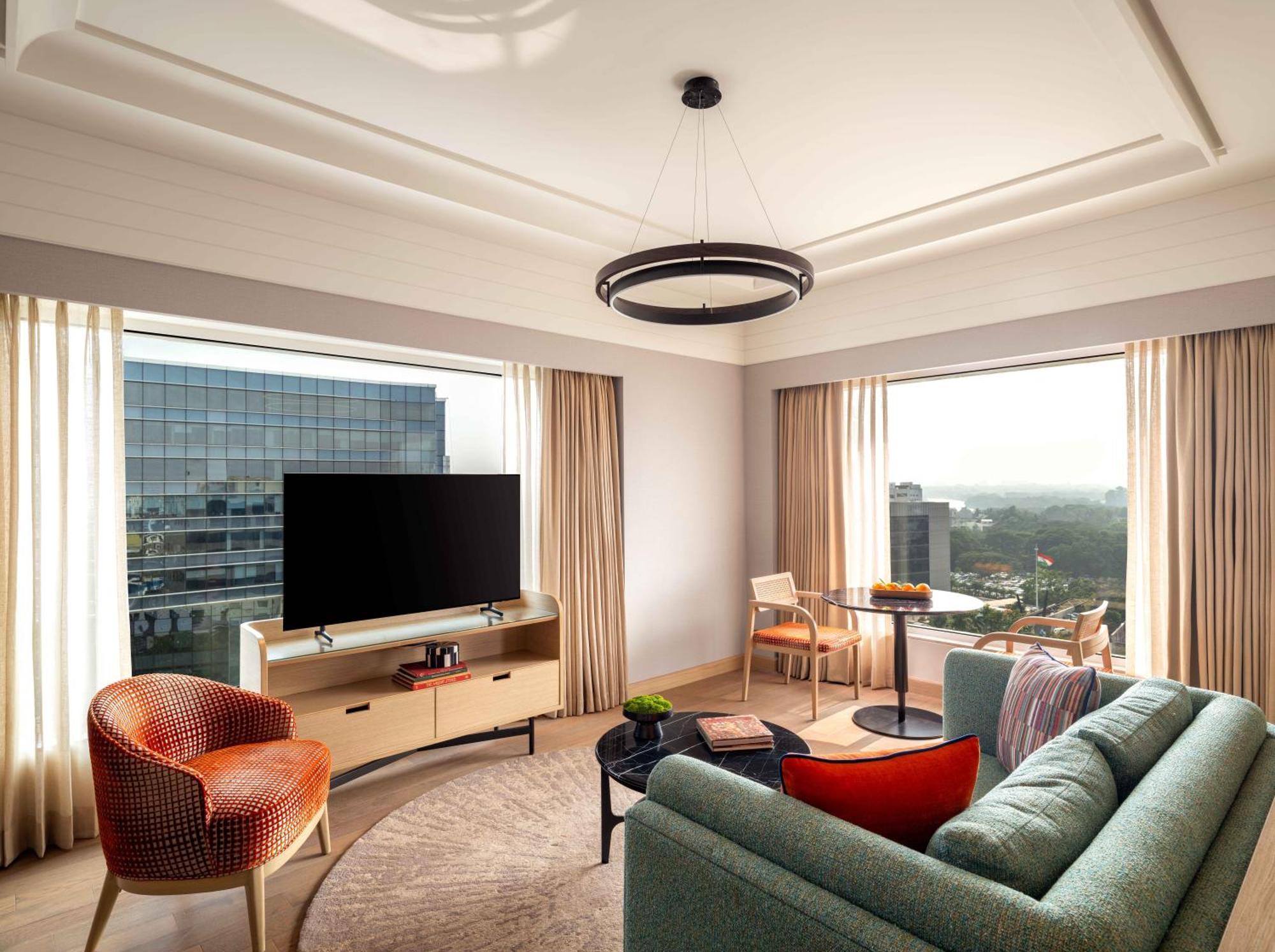 Deluxe Suite 1 King Bed - Lounge Access with Cocktail hours and One Way Airport Transfer