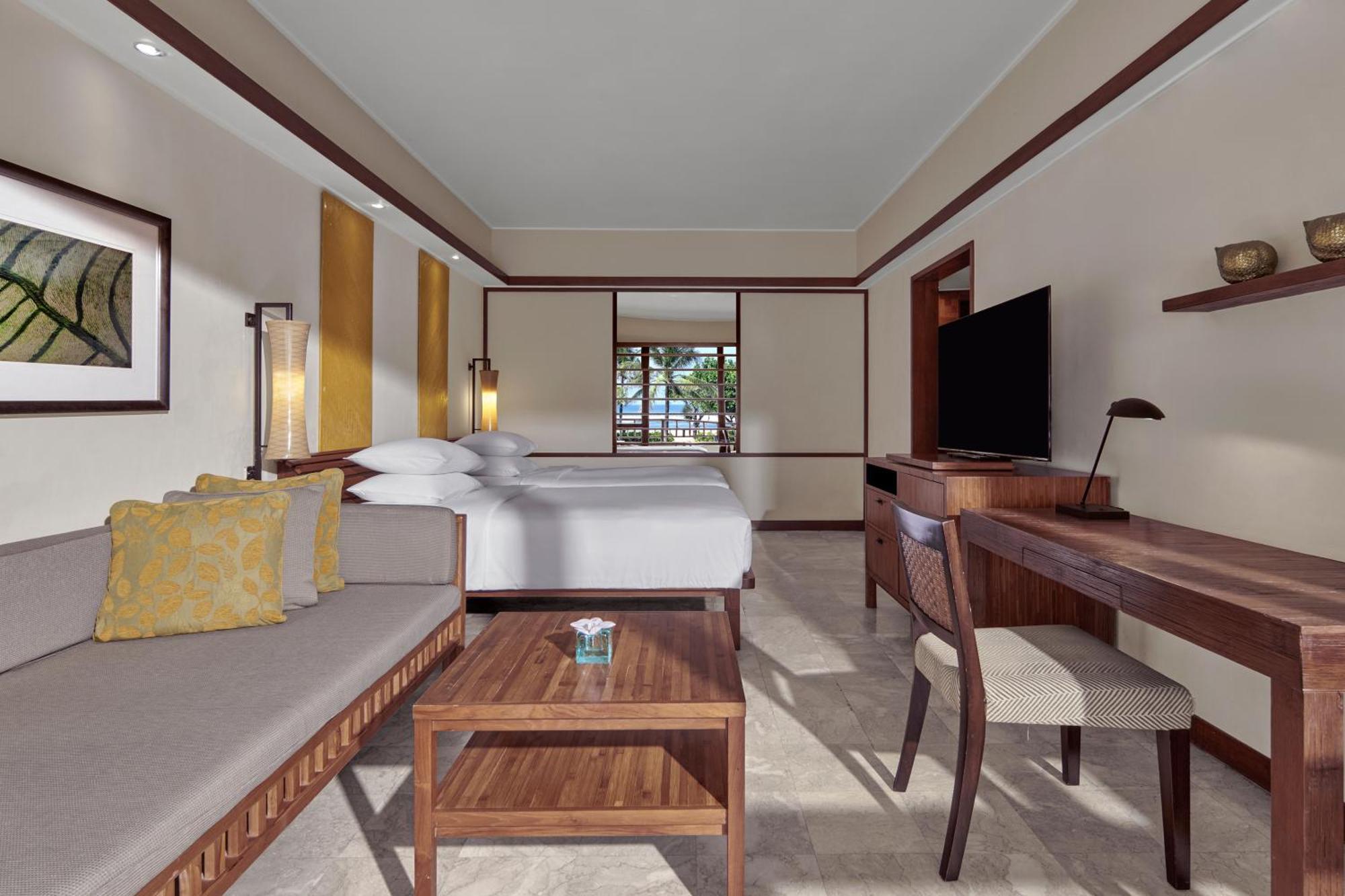 Quarto com 2 Camas de Solteiro e Vista do Mar - Acesso à Área VIP