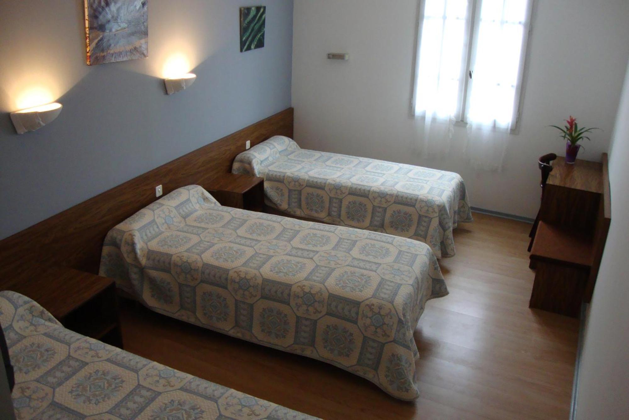 Quarto Triplo (3 Adultos)