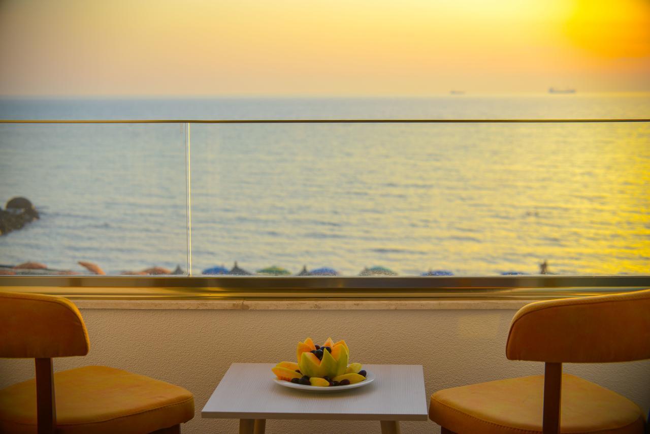Quarto Triplo Deluxe com Vista Mar