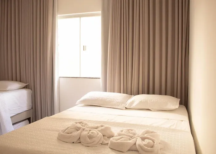 Hotel de praia: Apto Condomínio Recanto das Flores Taperapuã